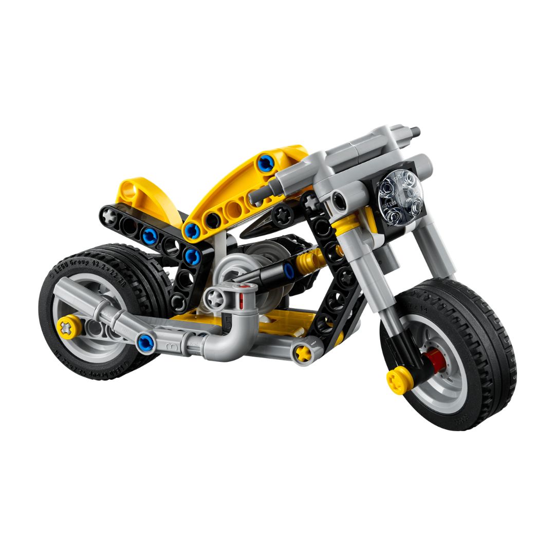 Toy motorcycle made of interlocking bricks on a white background