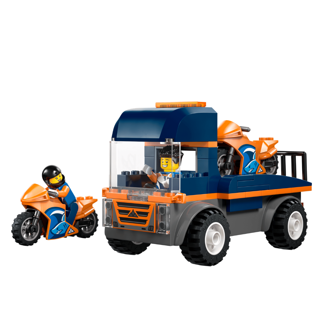A toy construction or utility truck set in navy blue and orange, shown with two small minifigures and matching orange motorcycles on a plain white background.