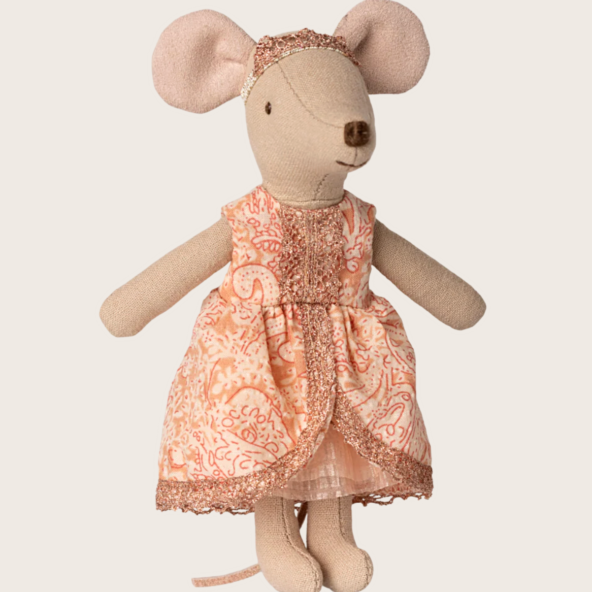 Stuffed mouse toy wearing a floral dress on a white background