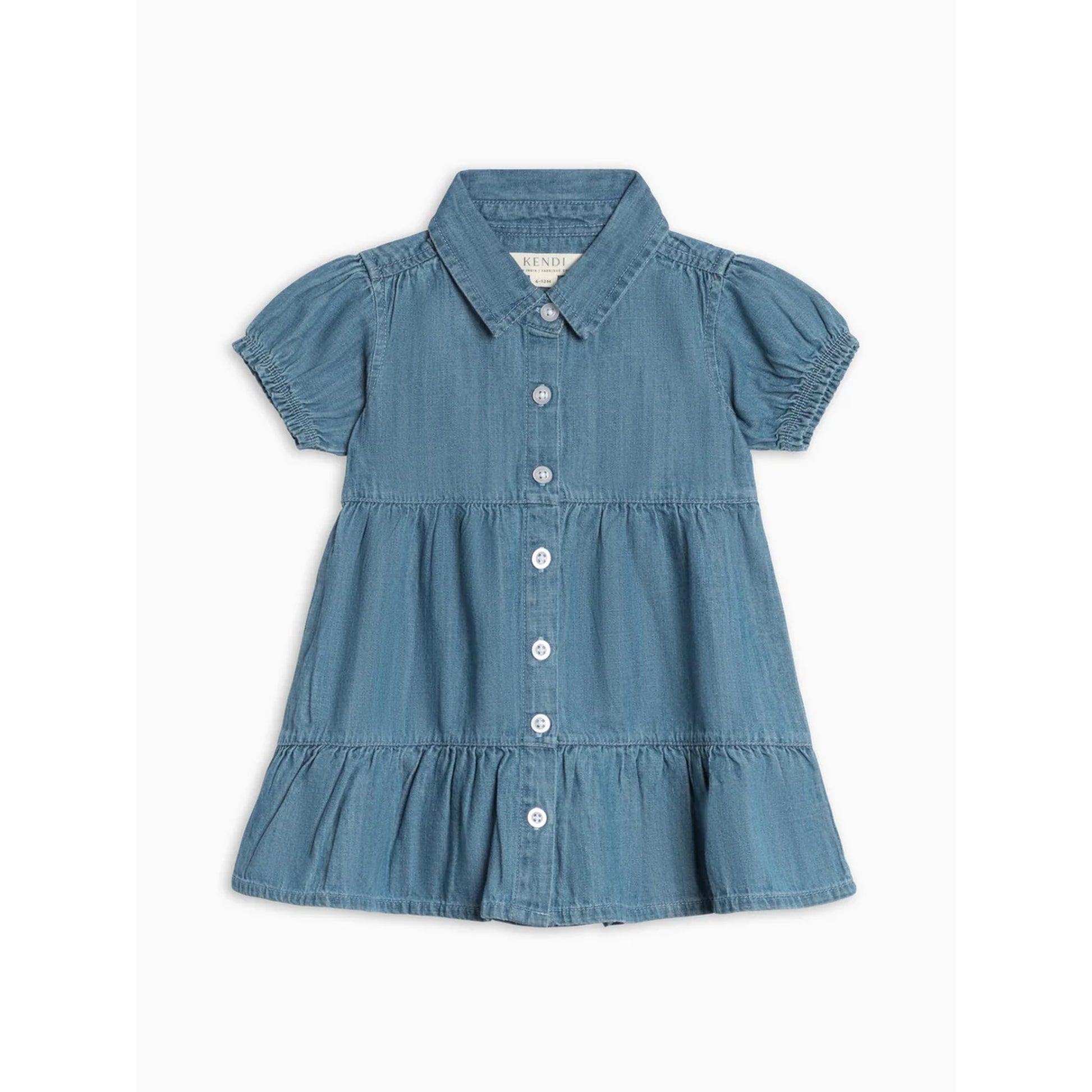 Blue denim dress with ruffled details on a white background