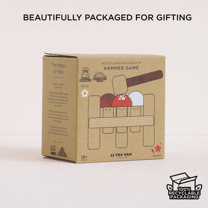 Le Toy Van wooden toy packaging with recyclable packaging label on a light pink background