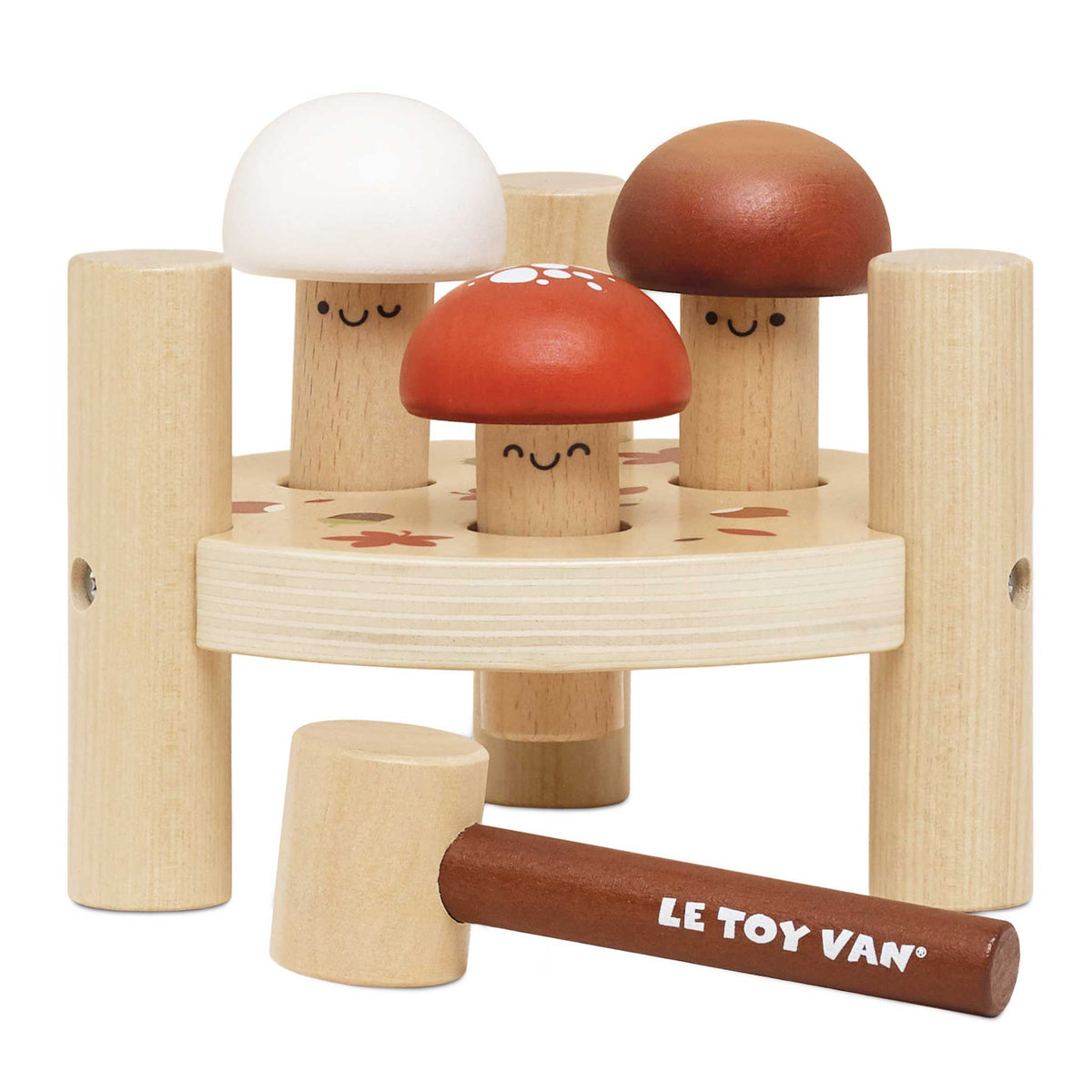Wooden toy with mushroom-shaped blocks and a mallet, featuring the Le Toy Van brand.