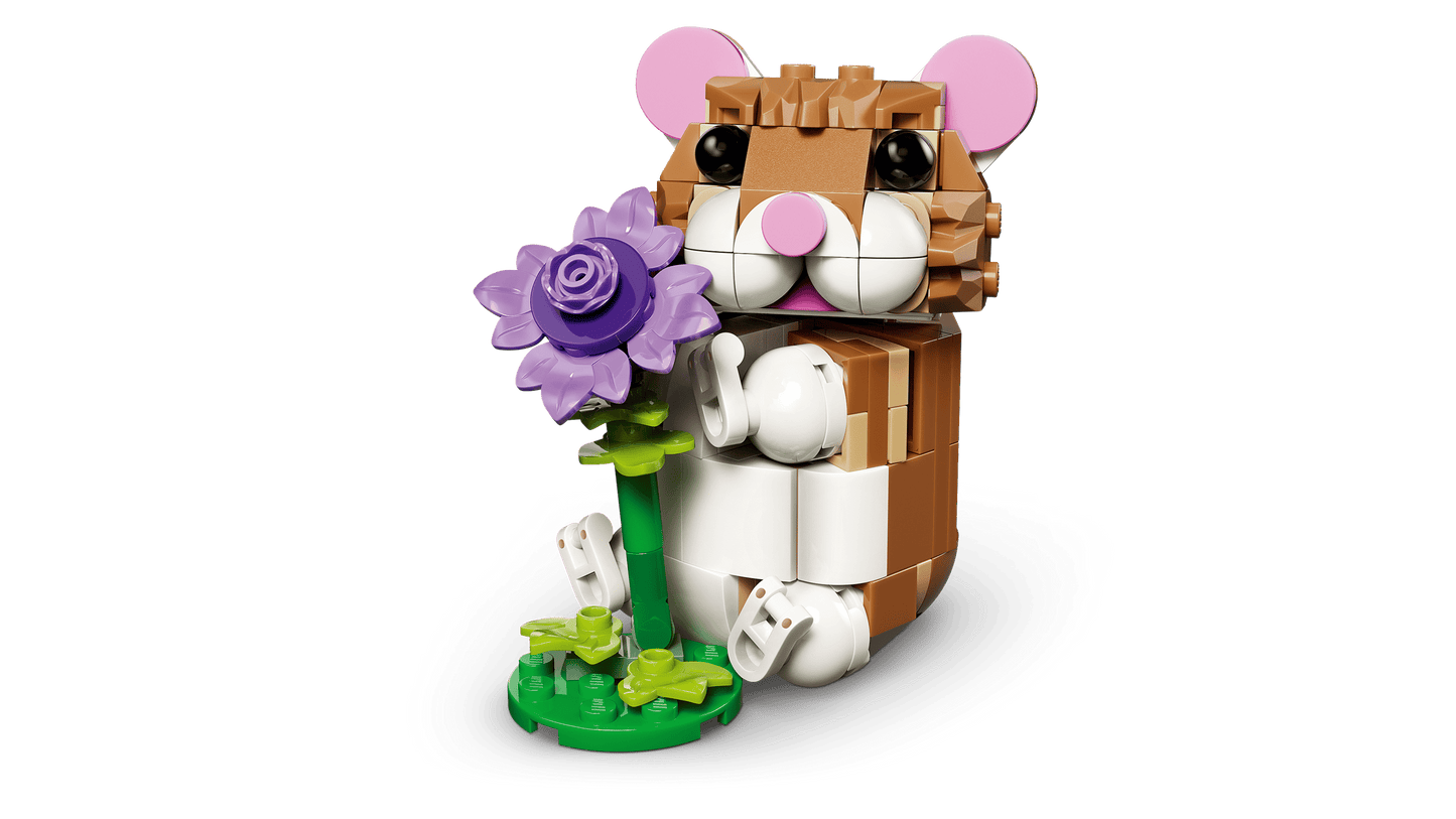 Toy figure of a hamster with flowers on a transparent background
