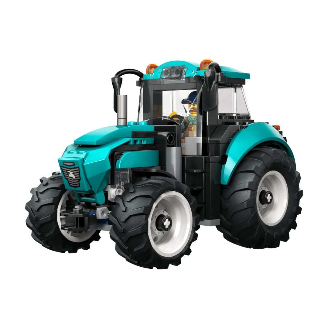Toy tractor made of interlocking bricks on a white background