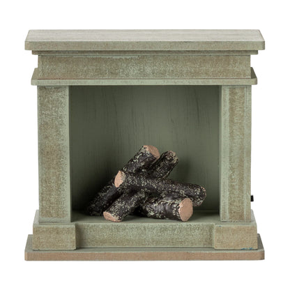 Decorative fireplace with logs inside on a white background
