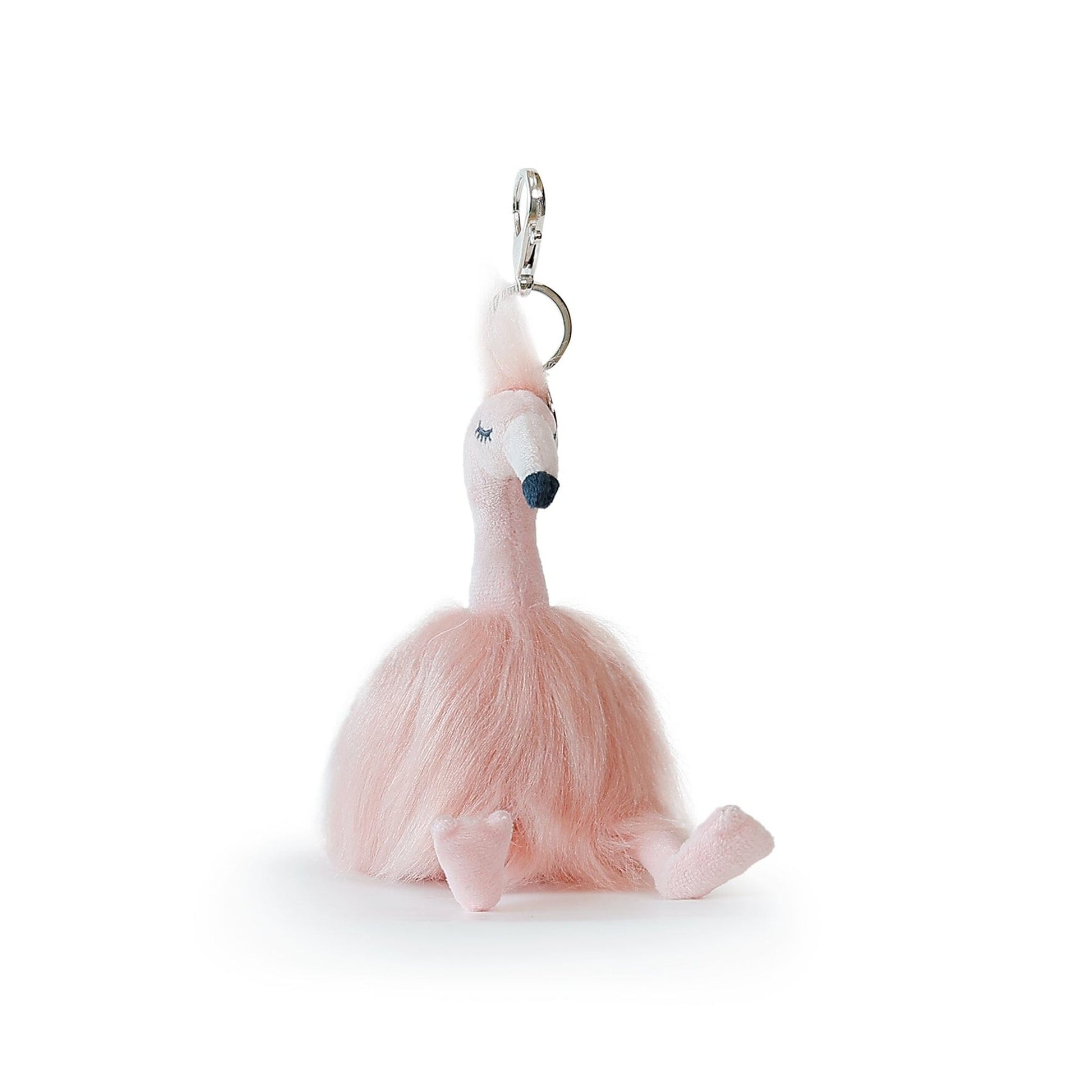 Pink flamingo keychain on a white background
