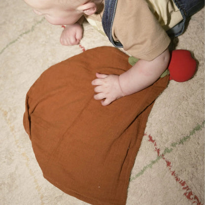 apple teether with baby