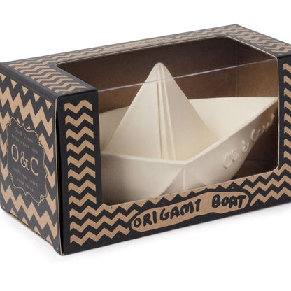 Origami boat in a decorative box with 'O&C' branding