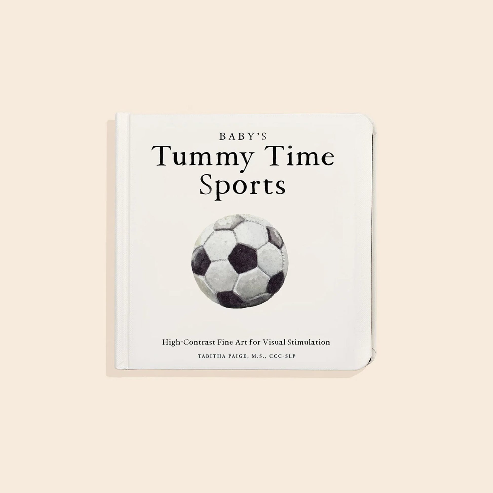 Book titled 'Baby's Tummy Time Sports' with a soccer ball illustration on a beige background