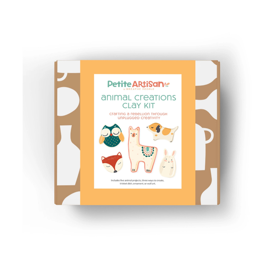 Petite Artisan Animal Creations Clay Kit in a square box with a peach and white design, featuring cartoon illustrations of an owl, llama, dog, fox, and rabbit on the front.