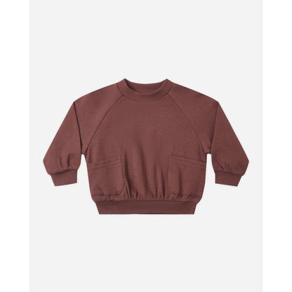 A dusty rose brown waffle-knit long-sleeve sweatshirt with front patch pockets, displayed flat against a light gray background.
