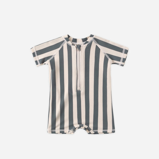 Striped baby romper on a white background
