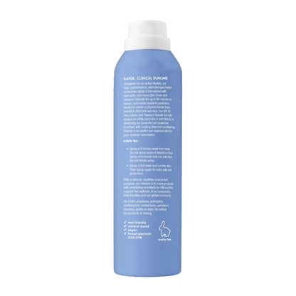Blue sunscreen spray bottle with white cap on a white background