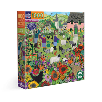 Jigsaw puzzle box with colorful village scene design on a white background