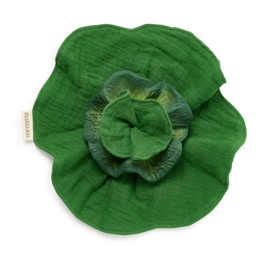 Green fabric flower on a white background
